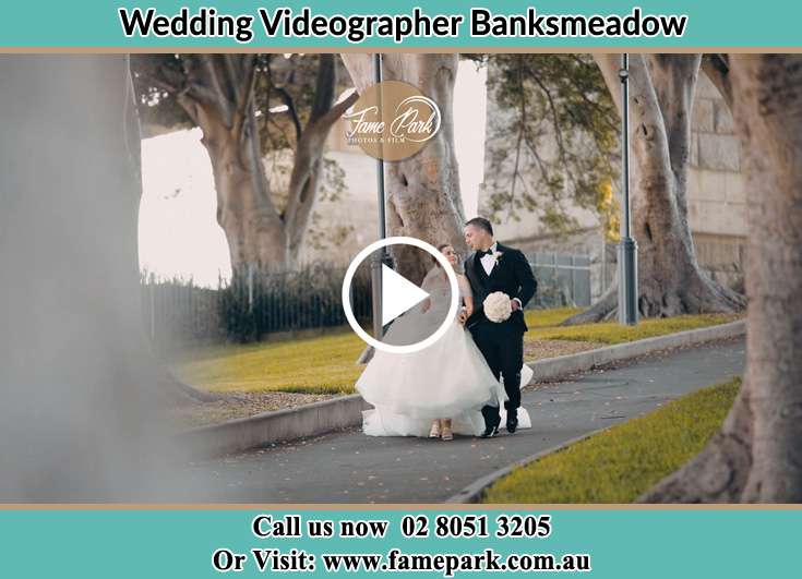 Bride and Groom walking at the park Banksmeadow NSW 2019