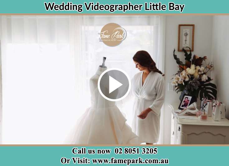 Bride looking at the gown Little Bay NSW 2036