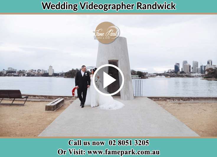 The Groom and the Bride walking away from the shore Randwick NSW 2031